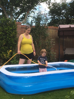 Willow filling up the paddling pool